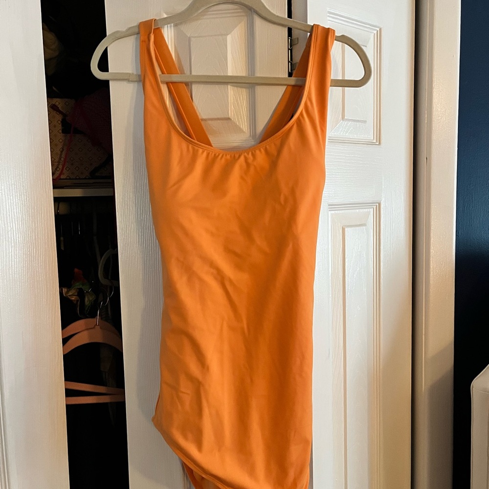 Andie Solid Orange Scoop One-Piece Swimsuit